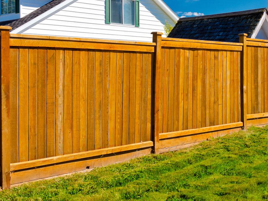 Hoschton GA cap and trim style wood fence