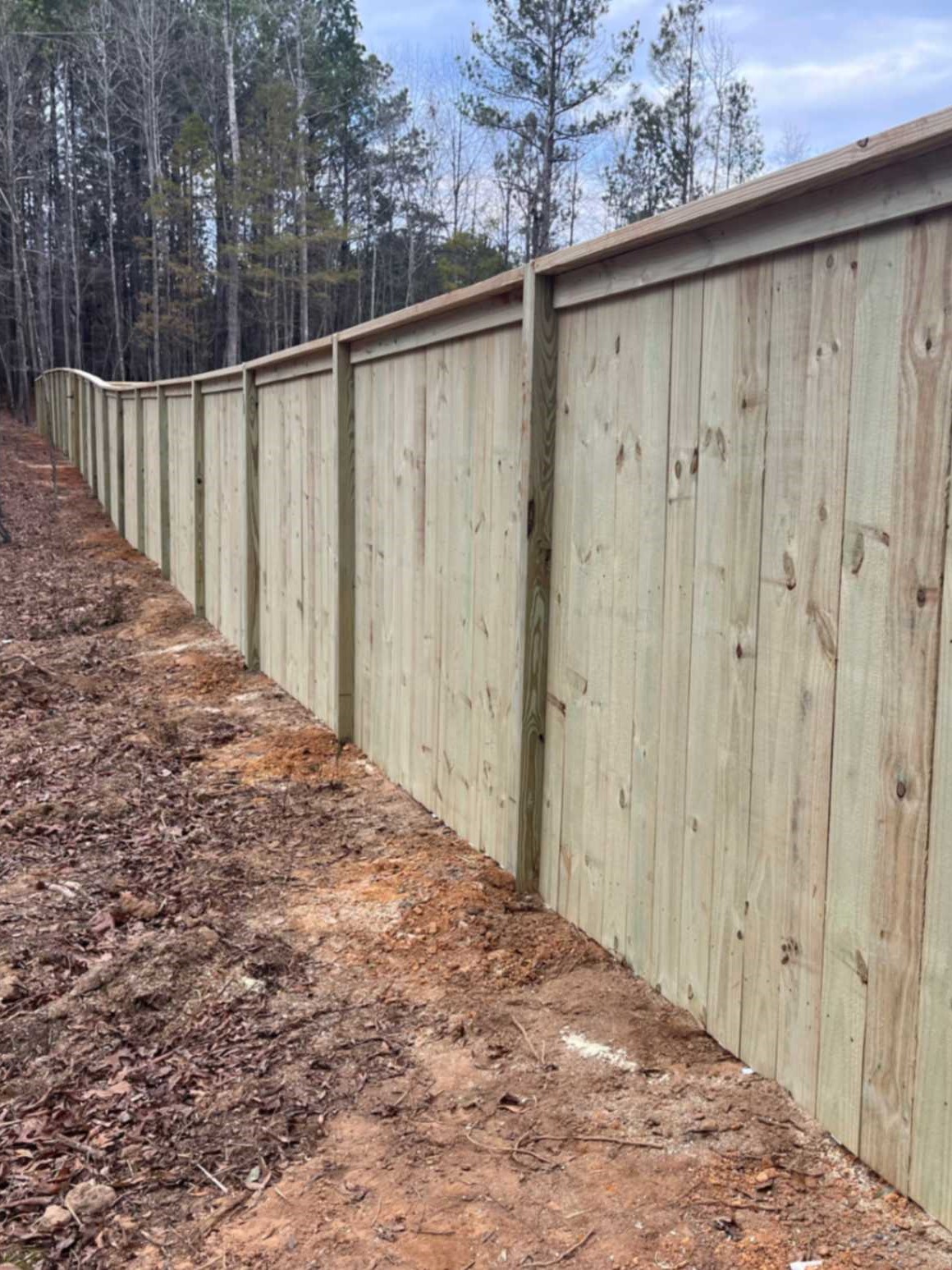 Professional Wood Fencing in Athens, GA, New privacy fence installed behind Walton County home for safer backyard and improved curb appeal